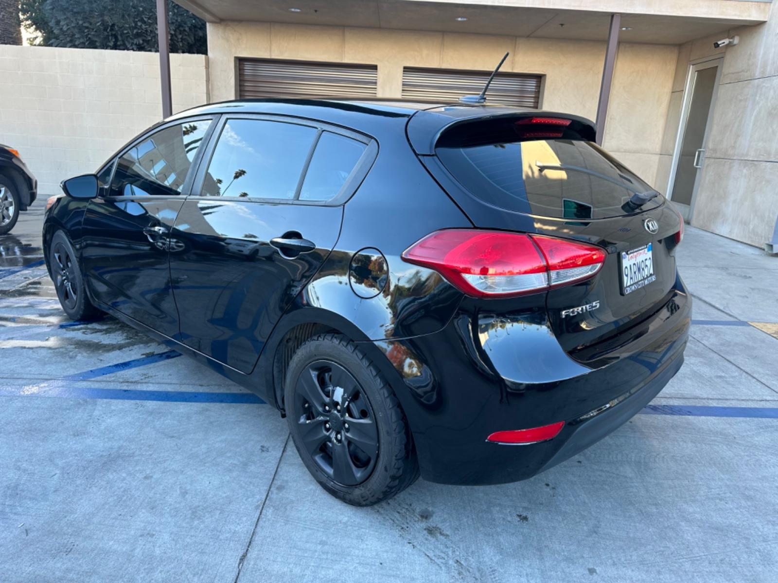 2016 Black /Black Kia Forte 5-Door Cloth (KNAFK5A87G5) with an 4 CYLINDER engine, Automatic transmission, located at 30 S. Berkeley Avenue, Pasadena, CA, 91107, (626) 248-7567, 34.145447, -118.109398 - Photo #2